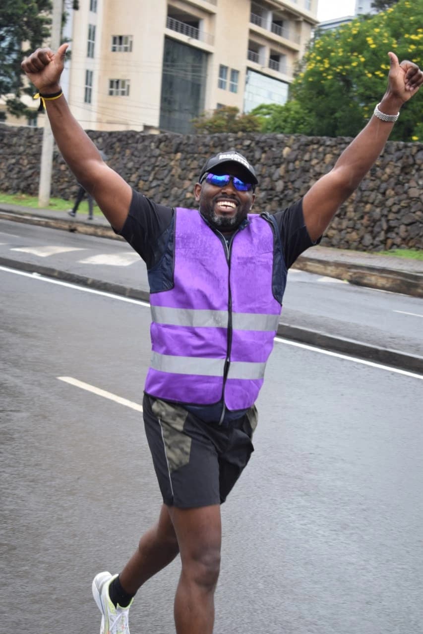 Charity run participant celebrating